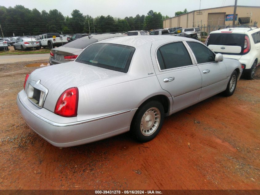 1999 Lincoln Town Car Executive VIN: 1LNHM81W7XY713204 Lot: 39431278