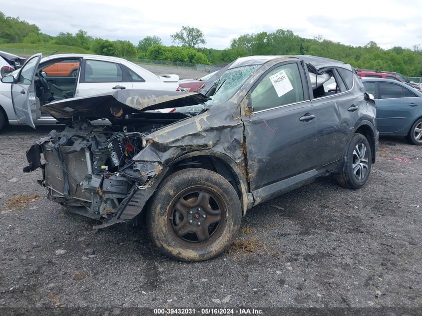 VIN JTMBFREV5JJ187134 2018 TOYOTA RAV4 LE