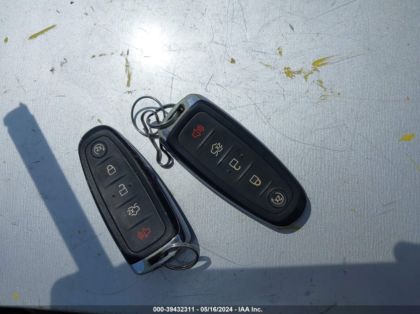 2014 Ford Focus Titanium VIN: 1FADP3N28EL206591 Lot: 39432311