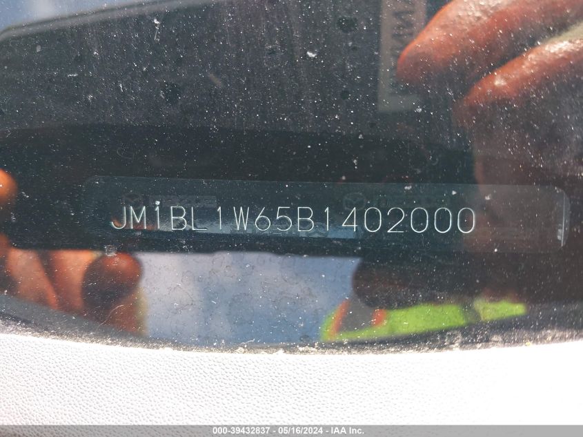 2011 Mazda Mazda3 S Grand Touring VIN: JM1BL1W65B1402000 Lot: 39432837