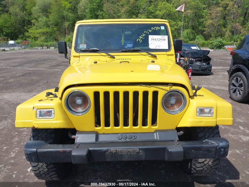 2001 Jeep Wrangler Sport VIN: 1J4FA49SX1P302014 Lot: 39432930