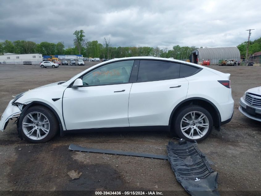 2023 Tesla Model Y Awd/Long Range Dual Motor All-Wheel Drive VIN: 7SAYGDEEXPF799455 Lot: 39434436