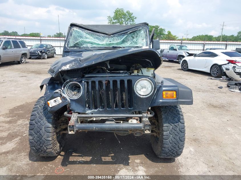 2000 Jeep Wrangler Sport VIN: 1J4FA49S5YP774843 Lot: 39435168