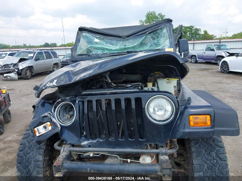 2000 Jeep Wrangler Sport VIN: 1J4FA49S5YP774843 Lot: 39435168