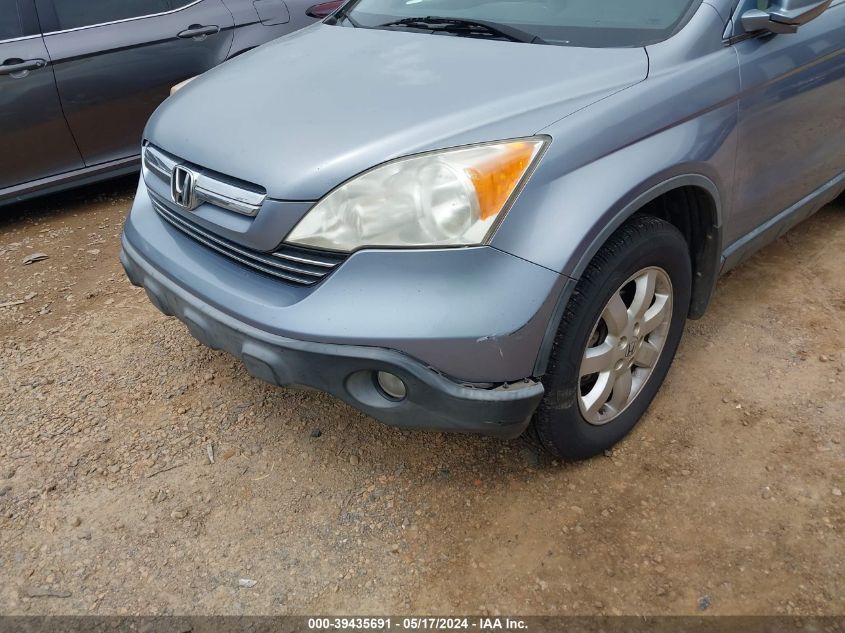 2007 Honda Cr-V Exl VIN: JHLRE38777C067007 Lot: 39435691