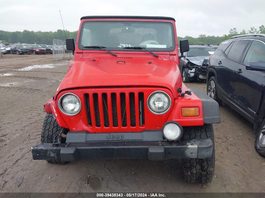 1999 Jeep Wrangler Sport VIN: 1J4FY19S2XP477697 Lot: 39438343