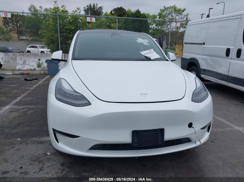 2023 Tesla Model Y Awd/Long Range Dual Motor All-Wheel Drive VIN: 7SAYGDEE6PF925391 Lot: 39438429