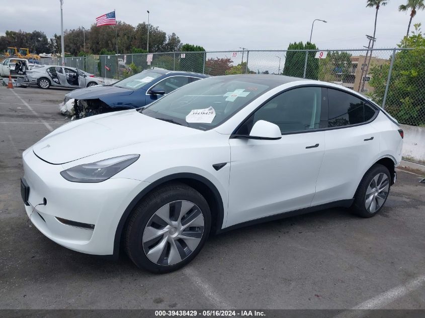 2023 Tesla Model Y Awd/Long Range Dual Motor All-Wheel Drive VIN: 7SAYGDEE6PF925391 Lot: 39438429