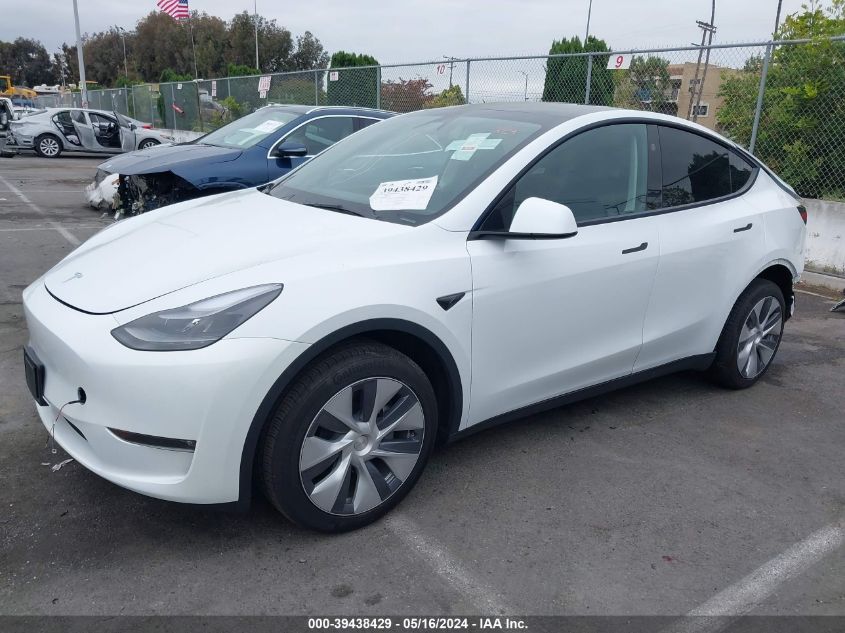 2023 Tesla Model Y Awd/Long Range Dual Motor All-Wheel Drive VIN: 7SAYGDEE6PF925391 Lot: 39438429