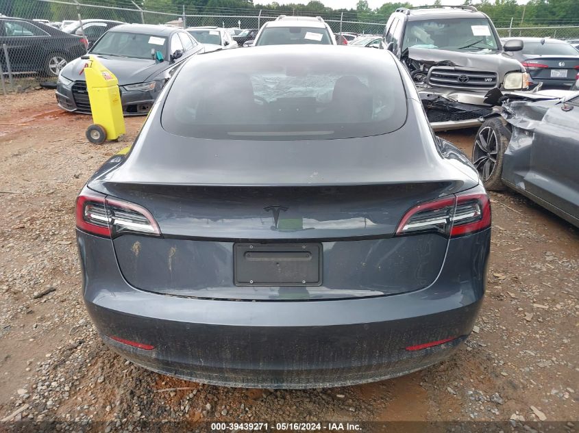 2021 Tesla Model 3 Standard Range Plus Rear-Wheel Drive VIN: 5YJ3E1EA9MF048027 Lot: 39439271