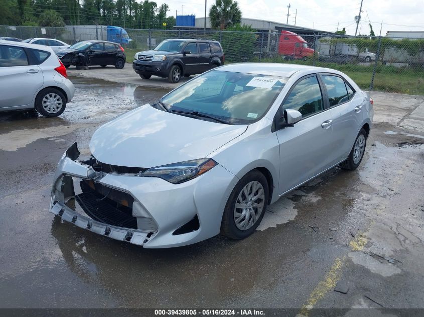 2018 Toyota Corolla Le VIN: 5YFBURHE7JP799574 Lot: 39439805