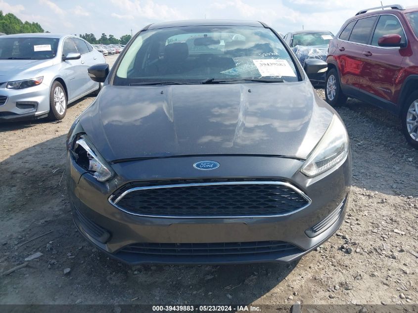 2015 Ford Focus Se VIN: 1FADP3F22FL381807 Lot: 39439883