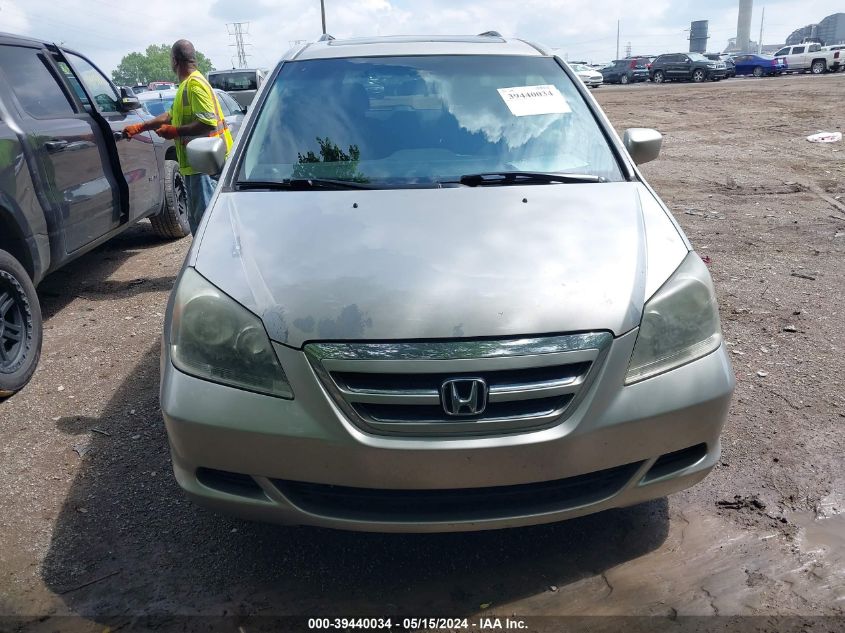 2007 Honda Odyssey Ex-L VIN: 5FNRL38707B138389 Lot: 39440034