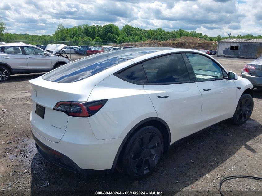 2023 Tesla Model Y Awd/Long Range Dual Motor All-Wheel Drive VIN: 7SAYGDEE0PF802038 Lot: 39440264