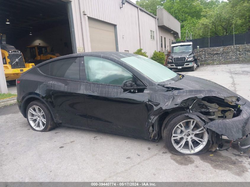 2023 Tesla Model Y Awd/Long Range Dual Motor All-Wheel Drive VIN: 7SAYGDEE0PF644655 Lot: 39440774