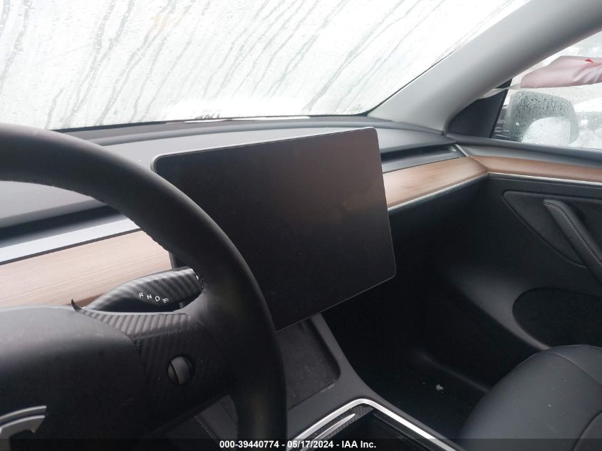 2023 Tesla Model Y Awd/Long Range Dual Motor All-Wheel Drive VIN: 7SAYGDEE0PF644655 Lot: 39440774