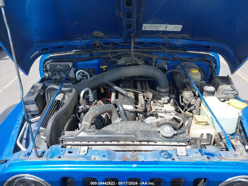 1999 Jeep Wrangler Sport VIN: 1J4FY19S2XP409545 Lot: 39442622