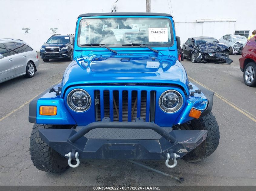 1999 Jeep Wrangler Sport VIN: 1J4FY19S2XP409545 Lot: 39442622