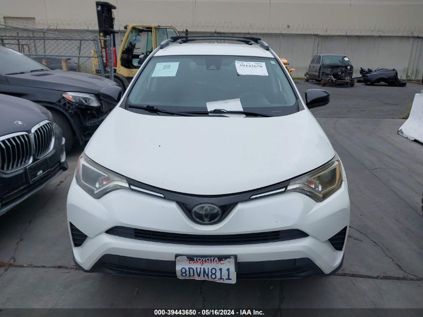 2018 Toyota Rav4 Le VIN: JTMZFREV1JJ177473 Lot: 39443650