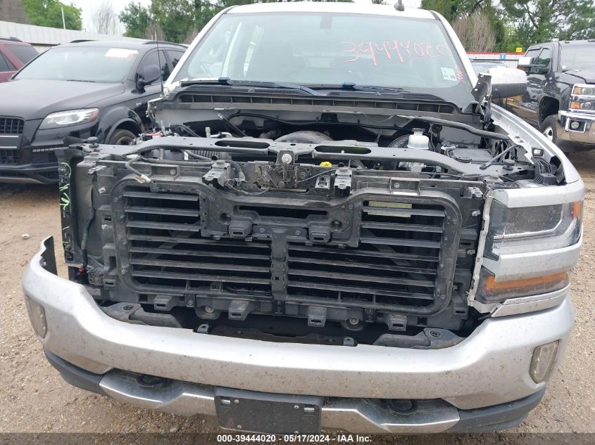 2018 Chevrolet Silverado 1500 2Lt VIN: 3GCUKREC1JG464804 Lot: 39444020