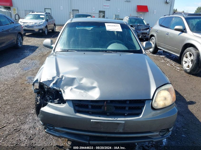 2004 Hyundai Accent Gl/Gt VIN: KMHCG35C54U301984 Lot: 39444633