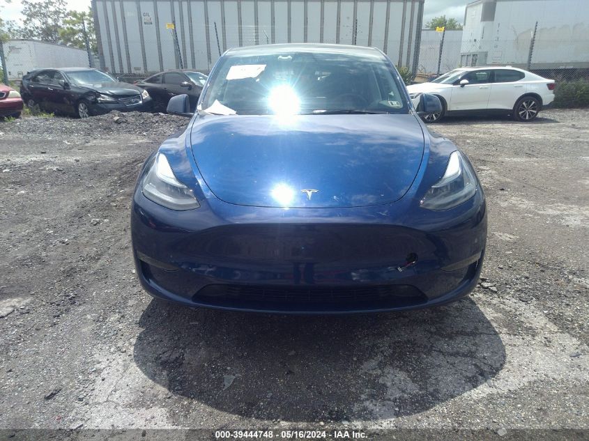 2023 Tesla Model Y VIN: 7SAYGDEE9PF791010 Lot: 39444748