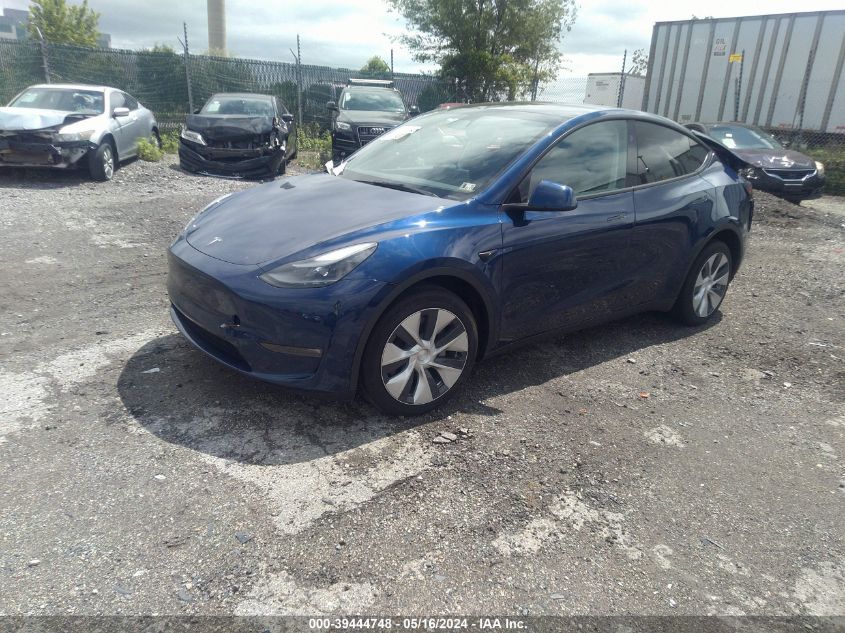 2023 Tesla Model Y VIN: 7SAYGDEE9PF791010 Lot: 39444748