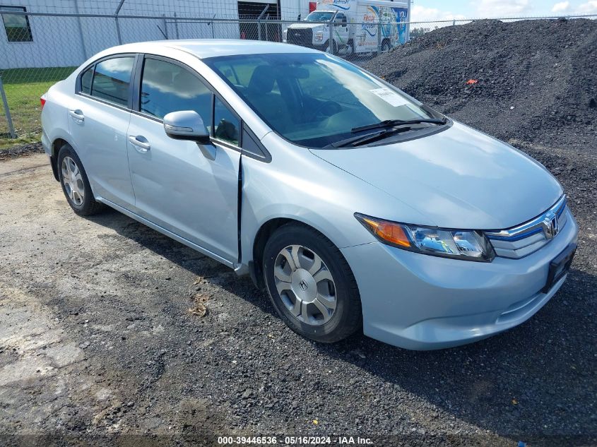 2012 Honda Civic Hybrid VIN: JHMFB4F39CS002740 Lot: 39446536