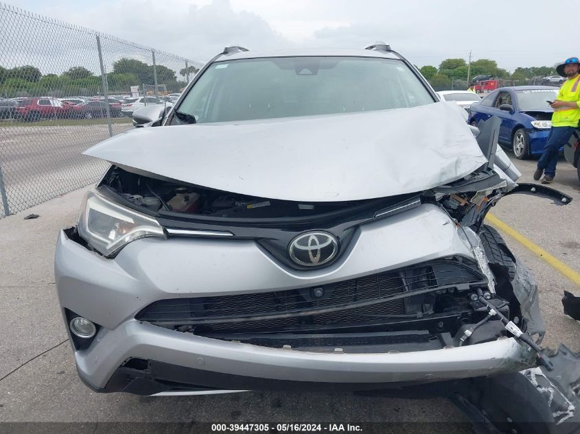 2016 Toyota Rav4 Limited VIN: 2T3YFREV1GW256289 Lot: 39447305