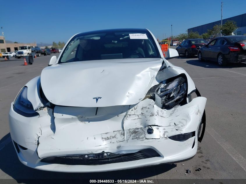 2023 Tesla Model Y Awd/Long Range Dual Motor All-Wheel Drive VIN: 7SAYGDEE3PA135947 Lot: 39448533