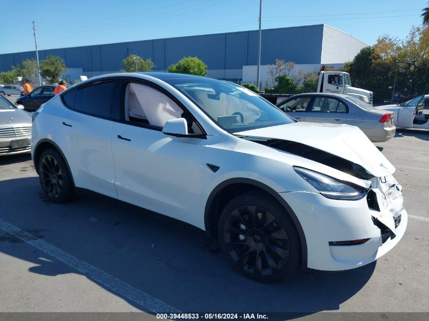 2023 Tesla Model Y Awd/Long Range Dual Motor All-Wheel Drive VIN: 7SAYGDEE3PA135947 Lot: 39448533