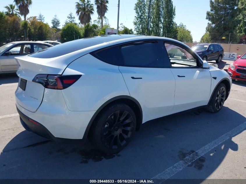 2023 Tesla Model Y Awd/Long Range Dual Motor All-Wheel Drive VIN: 7SAYGDEE3PA135947 Lot: 39448533