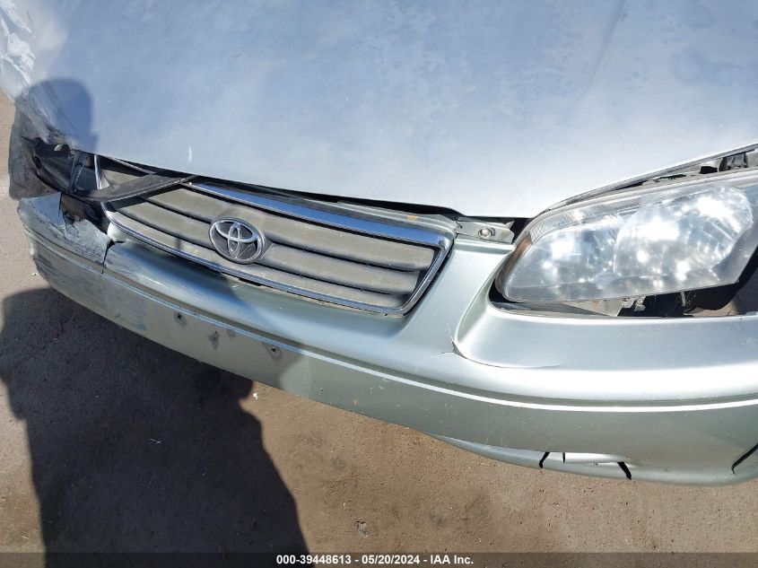 2000 Toyota Camry Le VIN: 4T1BG22KXYU661288 Lot: 39448613