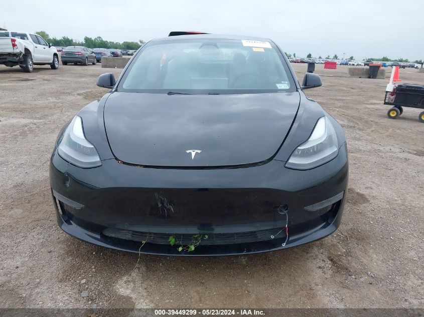 2021 Tesla Model 3 Standard Range Plus Rear-Wheel Drive VIN: 5YJ3E1EAXMF994184 Lot: 39449299