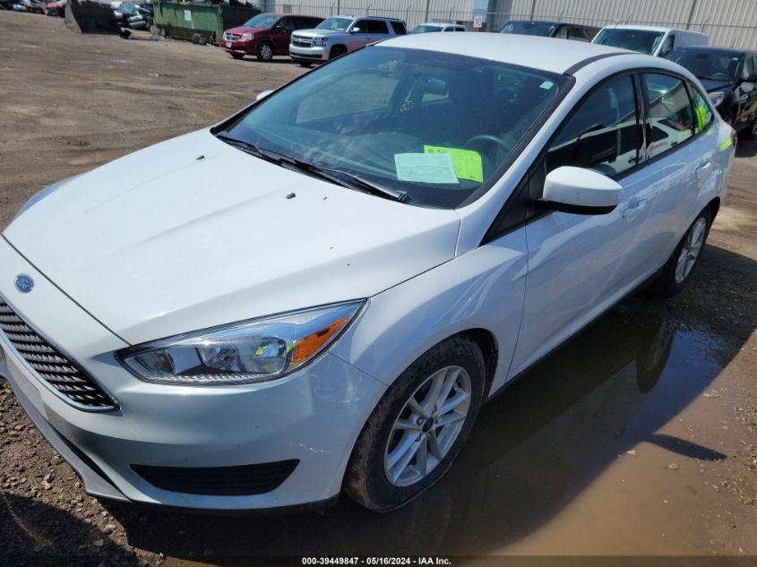 2018 Ford Focus Se VIN: 1FADP3F2XJL327986 Lot: 39449847