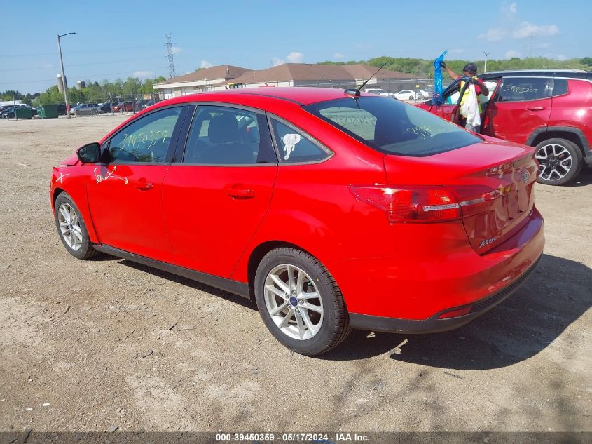 2015 Ford Focus Se VIN: 1FADP3F21FL298918 Lot: 39450359