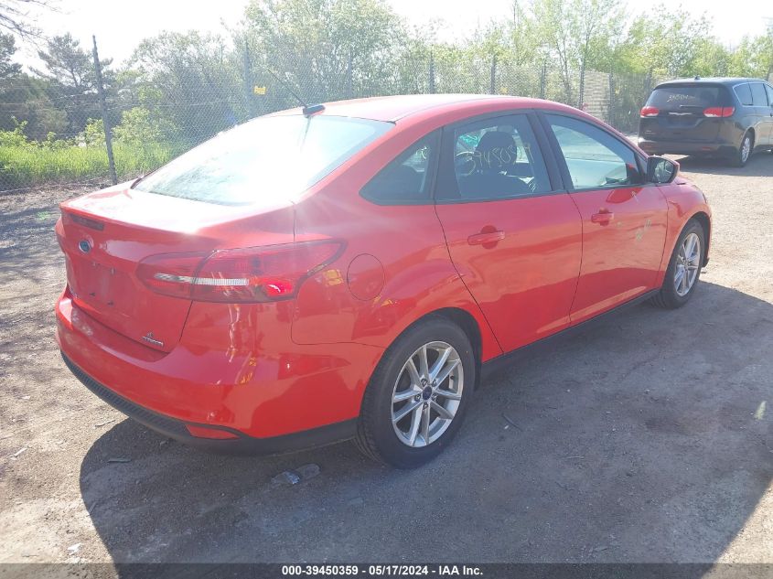 2015 Ford Focus Se VIN: 1FADP3F21FL298918 Lot: 39450359