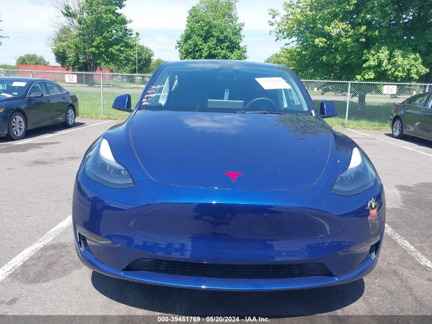 2023 Tesla Model Y Awd/Long Range Dual Motor All-Wheel Drive VIN: 7SAYGAEE6PF792145 Lot: 39451769