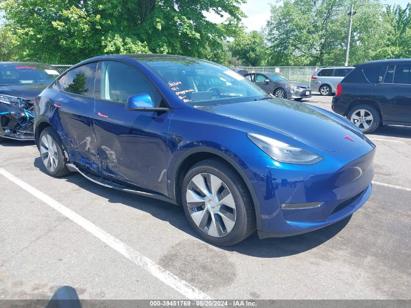 2023 Tesla Model Y Awd/Long Range Dual Motor All-Wheel Drive VIN: 7SAYGAEE6PF792145 Lot: 39451769