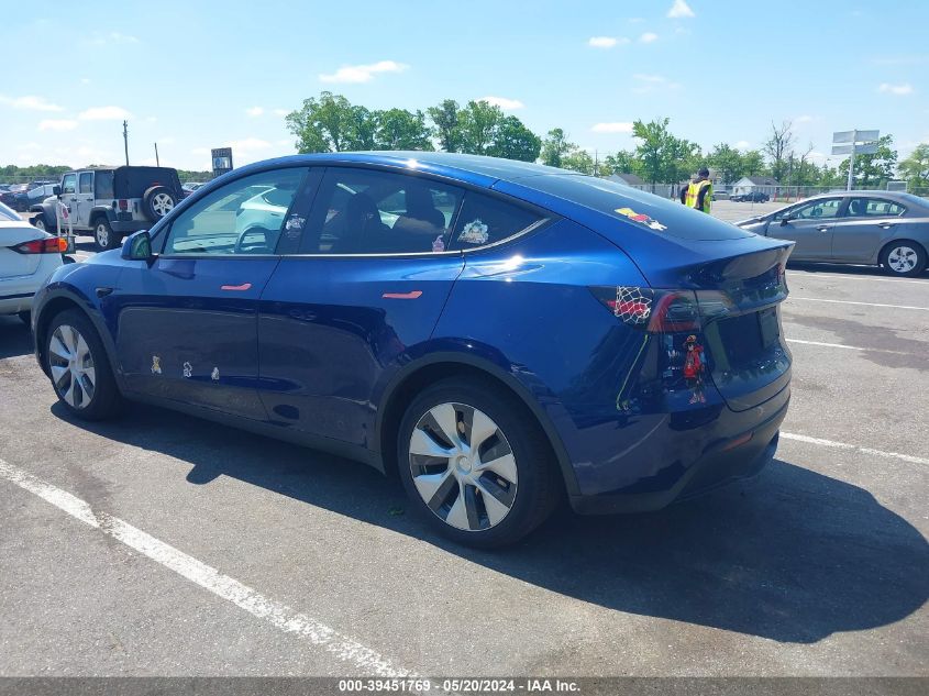 2023 Tesla Model Y Awd/Long Range Dual Motor All-Wheel Drive VIN: 7SAYGAEE6PF792145 Lot: 39451769