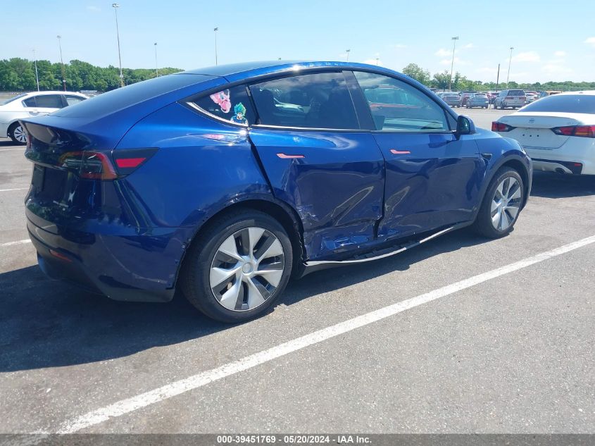 2023 Tesla Model Y Awd/Long Range Dual Motor All-Wheel Drive VIN: 7SAYGAEE6PF792145 Lot: 39451769