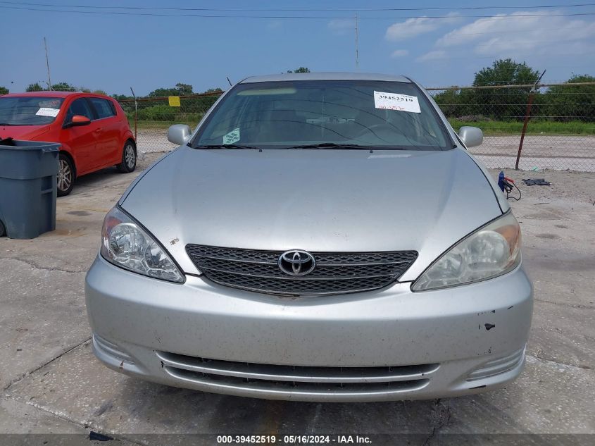 2004 Toyota Camry Le VIN: 4T1BE32K04U910607 Lot: 39452519