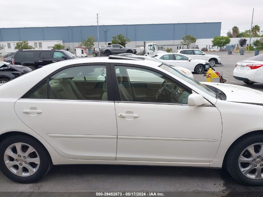 2004 Toyota Camry Le VIN: JTDBE30K040260904 Lot: 39452873