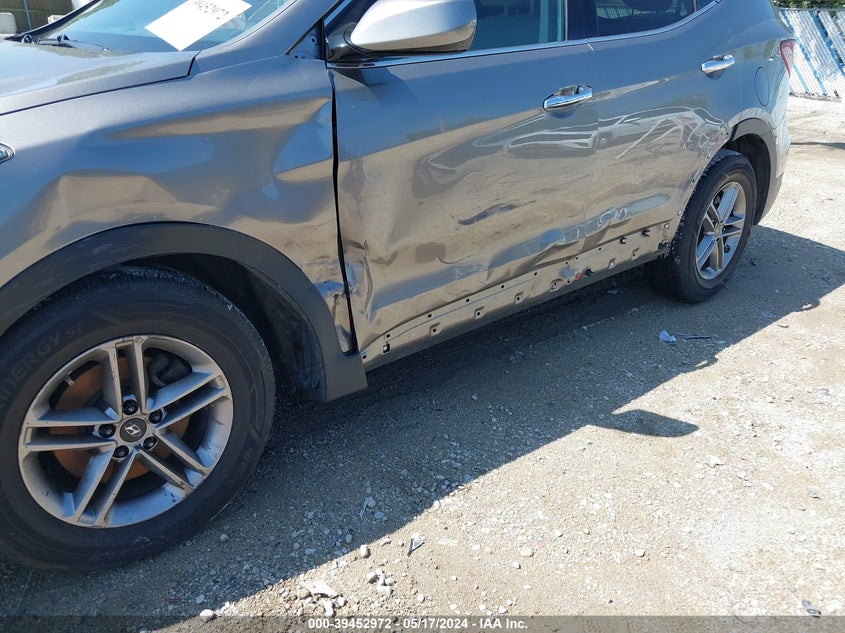 2018 Hyundai Santa Fe Sport 2.4L VIN: 5XYZT3LB4JG525605 Lot: 39452972