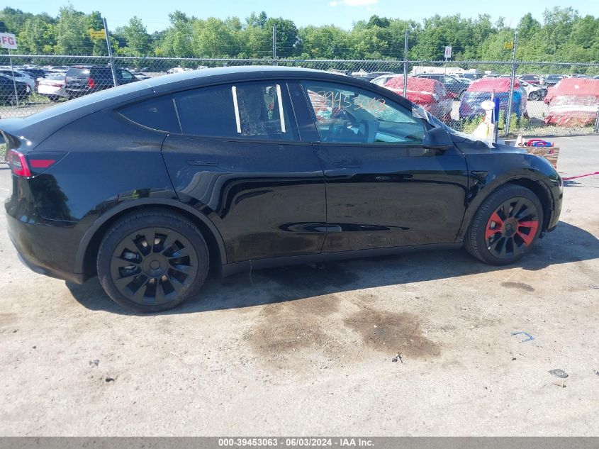 2023 Tesla Model Y Awd/Long Range Dual Motor All-Wheel Drive VIN: 7SAYGAEE6PF766239 Lot: 39453063