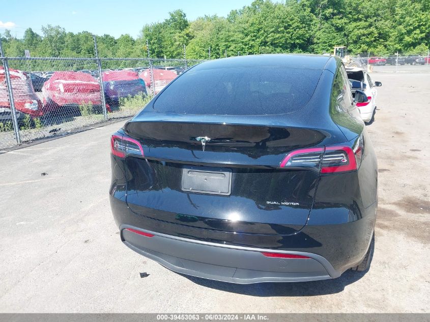 2023 Tesla Model Y Awd/Long Range Dual Motor All-Wheel Drive VIN: 7SAYGAEE6PF766239 Lot: 39453063