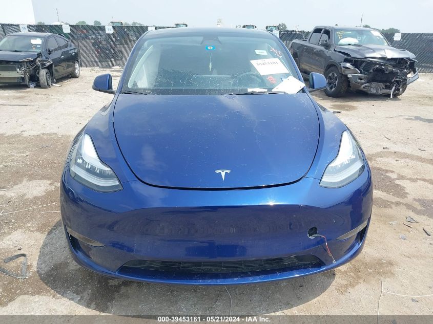 2023 Tesla Model Y Awd/Long Range Dual Motor All-Wheel Drive VIN: 7SAYGDEE6PA034157 Lot: 39453181