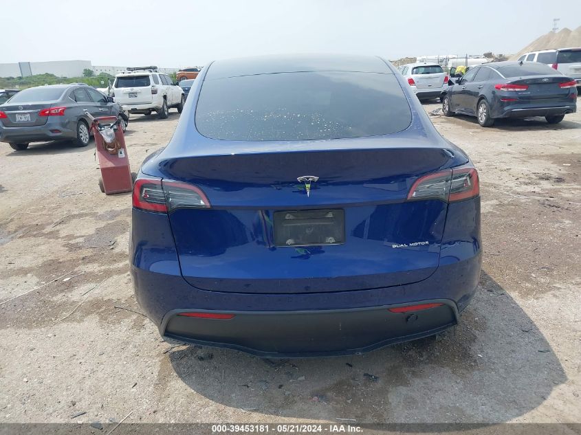 2023 Tesla Model Y Awd/Long Range Dual Motor All-Wheel Drive VIN: 7SAYGDEE6PA034157 Lot: 39453181