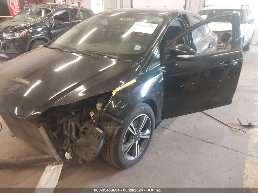 2014 Ford Focus Se VIN: 1FADP3F21EL349865 Lot: 39453694