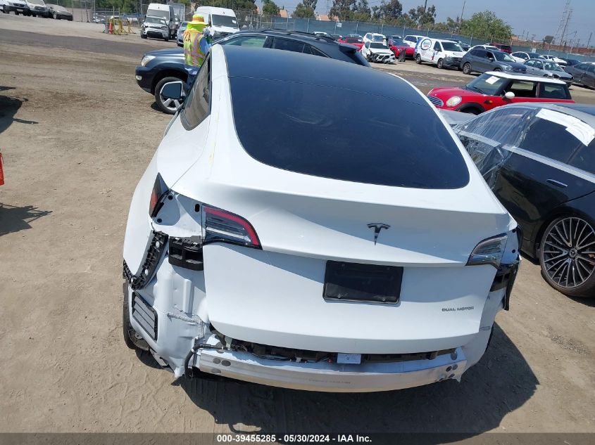 2023 Tesla Model Y Awd/Long Range Dual Motor All-Wheel Drive VIN: 7SAYGAEE5PF897453 Lot: 39455285